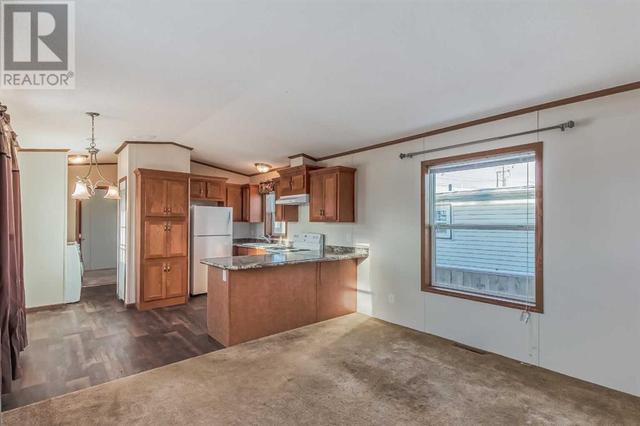 105, - 9090 24 Street Se, Home with 2 bedrooms, 1 bathrooms and 2 parking in Calgary AB | Image 11