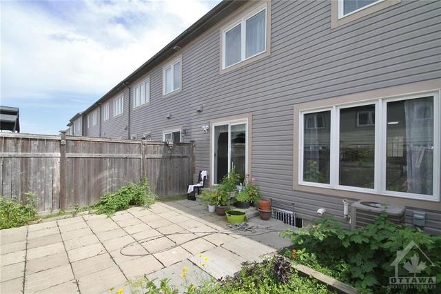 402 Meadowhawk Crescent, Townhouse with 3 bedrooms, 2 bathrooms and 2 parking in Ottawa ON | Image 30