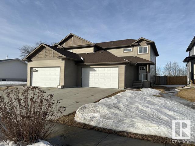 4914 47 St, House semidetached with 3 bedrooms, 2 bathrooms and null parking in Redwater AB | Image 2