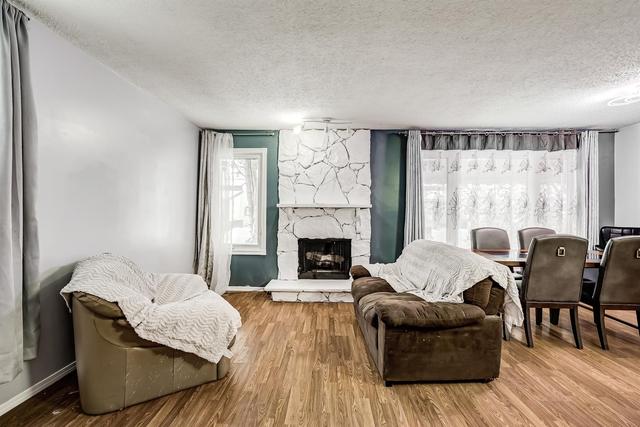 224 Pinemill Mews Ne, Home with 4 bedrooms, 2 bathrooms and 3 parking in Calgary AB | Image 3