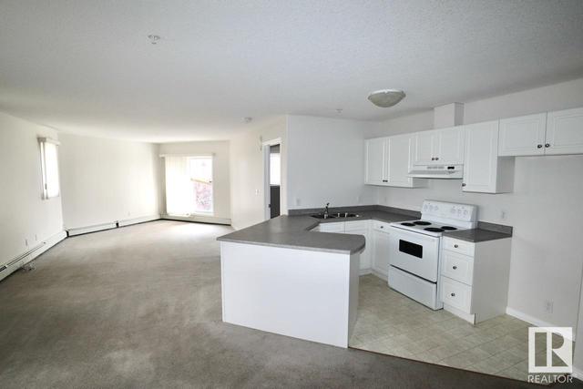 202 - 9930 100 Av, Condo with 2 bedrooms, 2 bathrooms and null parking in Fort Saskatchewan AB | Image 3