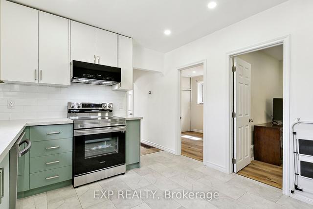 36 Twenty Fourth St, House detached with 3 bedrooms, 2 bathrooms and 2 parking in Toronto ON | Image 3