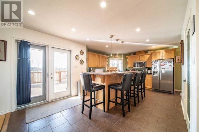 14, - 65016 Twp Rd 442, House detached with 6 bedrooms, 4 bathrooms and 10 parking in Wainwright No. 61 AB | Image 5