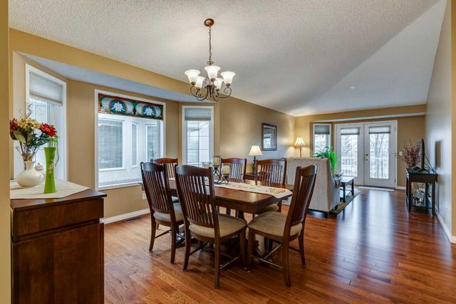 133 Sienna Park Green Sw, Home with 3 bedrooms, 2 bathrooms and 4 parking in Calgary AB | Image 8