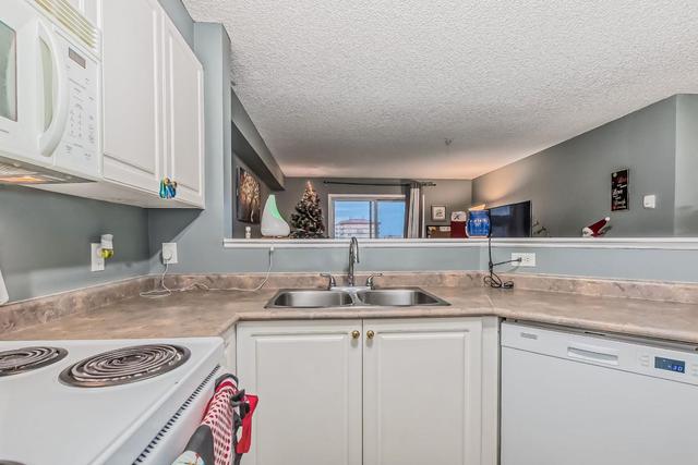 6304 - 304 Mackenzie Way Sw, Condo with 2 bedrooms, 1 bathrooms and 1 parking in Airdrie AB | Image 8