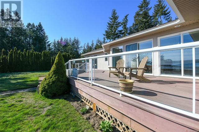 501 Arbutus Bay Rd, House detached with 3 bedrooms, 3 bathrooms and 10 parking in Comox Valley A BC | Image 37