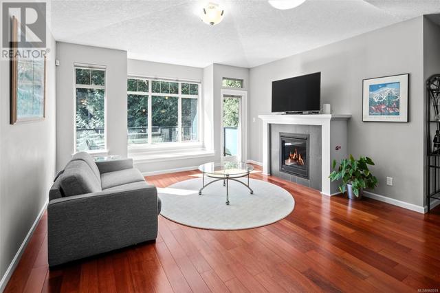 Living room with natural gas fireplace | Image 11