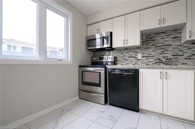 a - 52 Harris Avenue, House attached with 3 bedrooms, 1 bathrooms and 2 parking in Brantford ON | Image 14