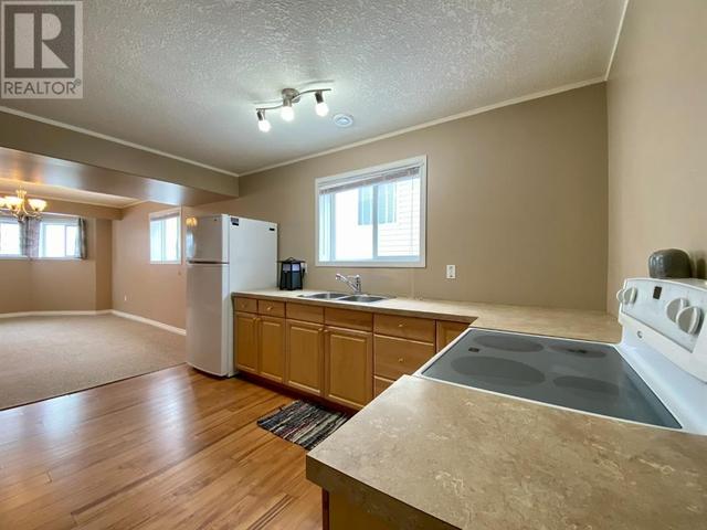 629 6a Street, House detached with 4 bedrooms, 3 bathrooms and 4 parking in Beaverlodge AB | Image 37