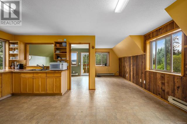 8185 Island Hwy S, House detached with 4 bedrooms, 4 bathrooms and 6 parking in Comox Valley A BC | Image 69