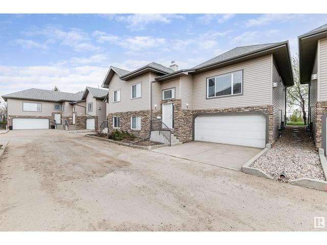 10 - 17715 96 Av Nw, House semidetached with 4 bedrooms, 3 bathrooms and null parking in Edmonton AB | Card Image