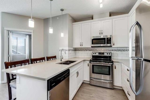 1407 - 522 Cranford Drive Se, Condo with 2 bedrooms, 2 bathrooms and 1 parking in Calgary AB | Image 3