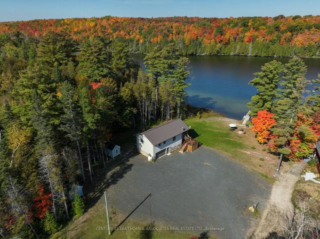 1014 Lyons Gate Lane, House detached with 3 bedrooms, 2 bathrooms and 15 parking in North Frontenac ON | Image 23
