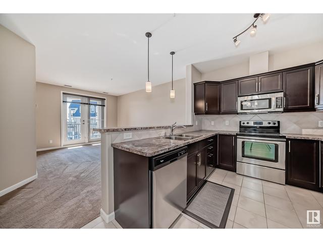 310 - 6083 Maynard Wy Nw, Condo with 1 bedrooms, 1 bathrooms and 2 parking in Edmonton AB | Image 12