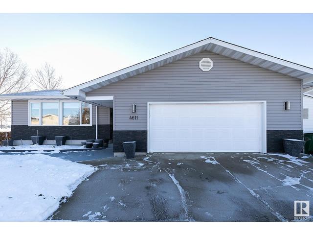4611 128 Av Nw, House detached with 4 bedrooms, 3 bathrooms and null parking in Edmonton AB | Card Image