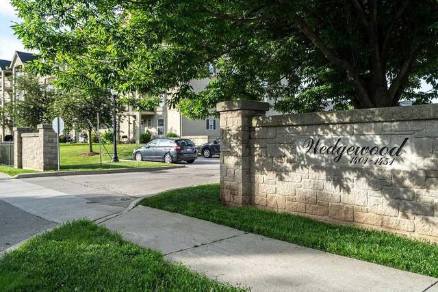 302 - 1421 Walkers Line, Townhouse with 2 bedrooms, 2 bathrooms and 1 parking in Burlington ON | Card Image