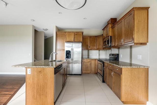 2 - 441 Millennium Drive, Home with 3 bedrooms, 3 bathrooms and 4 parking in Wood Buffalo AB | Image 3
