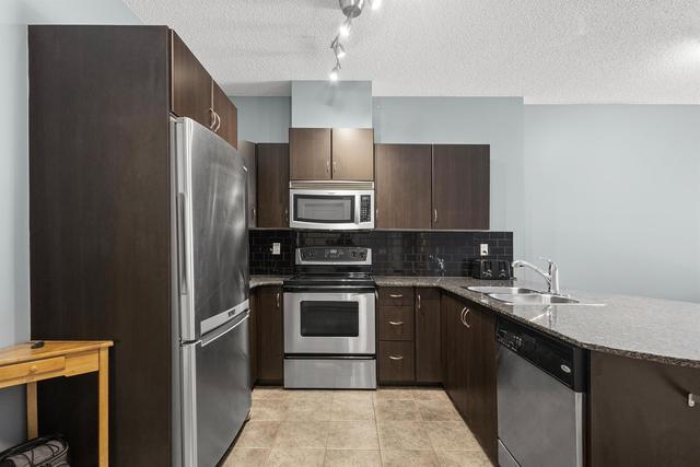 1610 - 11811 Lake Fraser Drive Se, Condo with 2 bedrooms, 1 bathrooms and 1 parking in Calgary AB | Image 2