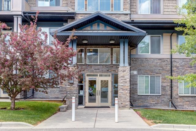 103 - 10 Panatella Road Nw, Condo with 2 bedrooms, 2 bathrooms and 1 parking in Calgary AB | Image 1