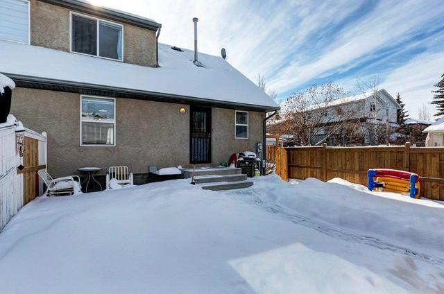 38 Quentin Place Sw, Home with 3 bedrooms, 2 bathrooms and 2 parking in Calgary AB | Image 26