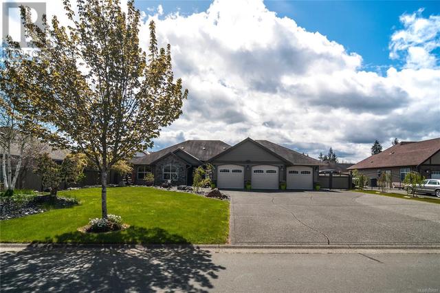 2175 Forest Grove Dr, House detached with 4 bedrooms, 2 bathrooms and 3 parking in Campbell River BC | Card Image