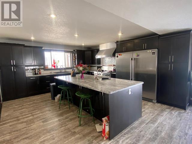 225041 690, House detached with 5 bedrooms, 3 bathrooms and 15 parking in Northern Lights County AB | Image 11