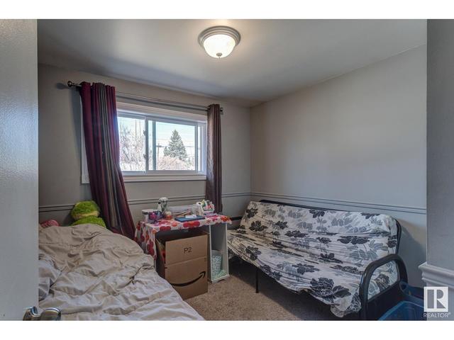 10560 52 Av Nw, House detached with 6 bedrooms, 2 bathrooms and null parking in Edmonton AB | Image 18