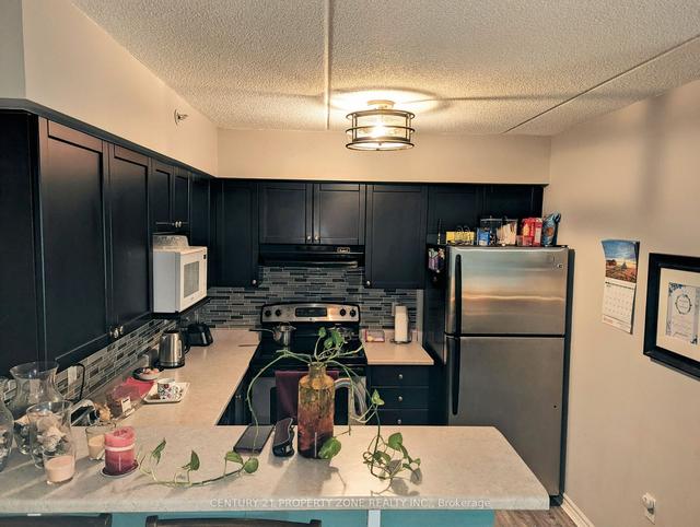 206 - 1340 Main St E, Condo with 1 bedrooms, 1 bathrooms and 2 parking in Milton ON | Image 5