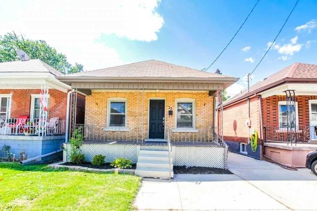 23 Cameron Ave N, House detached with 2 bedrooms, 2 bathrooms and 2 parking in Hamilton ON | Image 1