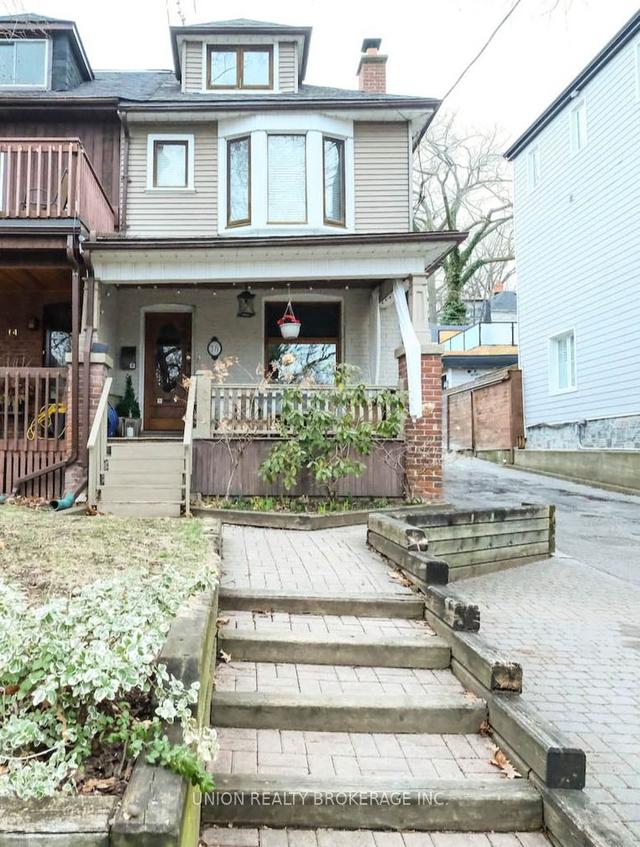 16 Cedar Ave, House semidetached with 4 bedrooms, 2 bathrooms and 1 parking in Toronto ON | Image 1