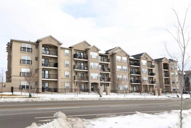 309 - 1487 Maple Ave, Condo with 2 bedrooms, 1 bathrooms and 1 parking in Milton ON | Image 1