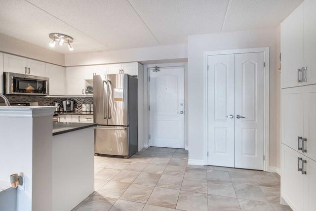 104 - 1450 Main St E, Condo with 2 bedrooms, 2 bathrooms and 1 parking in Milton ON | Image 24