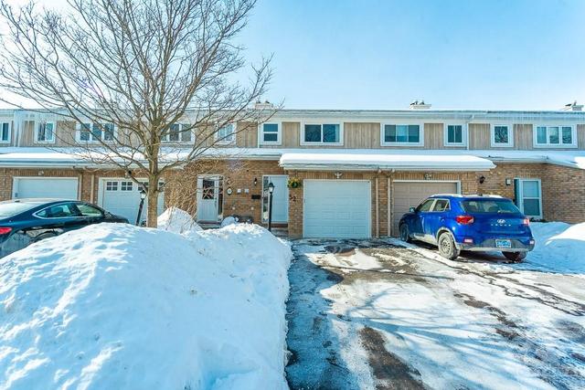 52 Hummingbird Crescent, Townhouse with 3 bedrooms, 3 bathrooms and 3 parking in Ottawa ON | Image 1