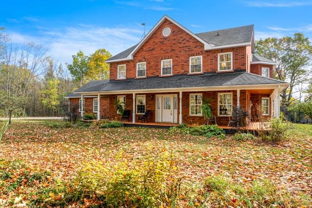 Natural 144 acre setting for this gracious brick 4 bed, 2.5 bath home | Image 1
