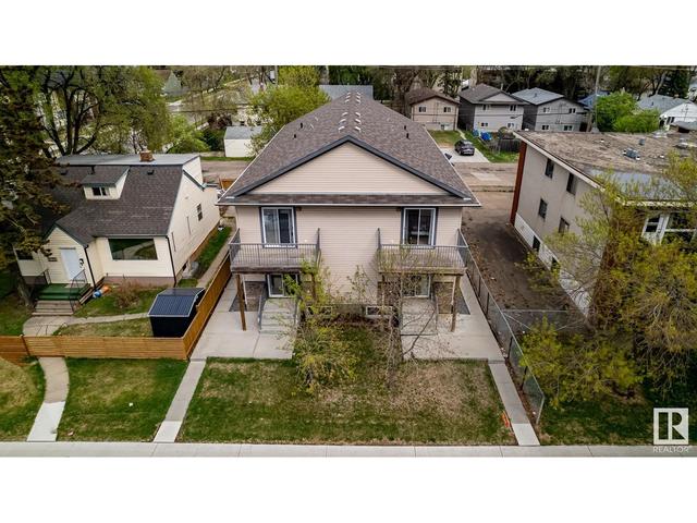 11841 97 St Nw, House attached with 3 bedrooms, 2 bathrooms and 4 parking in Edmonton AB | Image 6