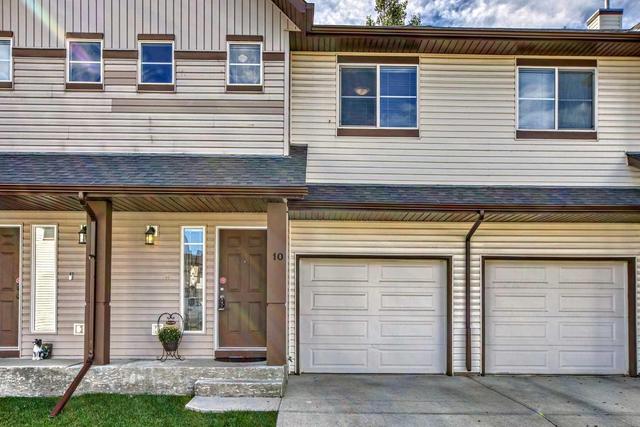 10 Everridge Gardens Sw, Home with 2 bedrooms, 2 bathrooms and 2 parking in Calgary AB | Image 2