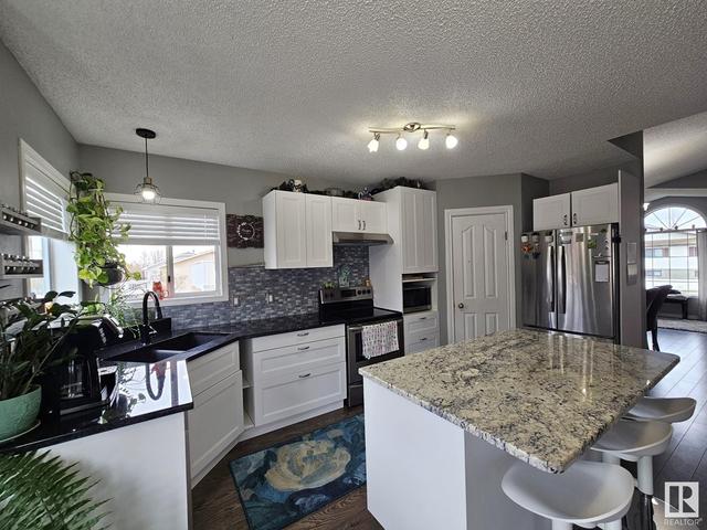 3744 49 Av, House detached with 4 bedrooms, 2 bathrooms and null parking in Drayton Valley AB | Image 12