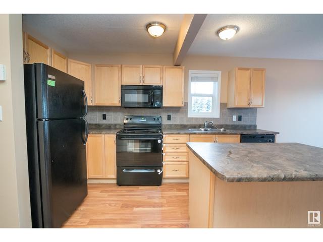 2136 Hammond Co Nw, House semidetached with 3 bedrooms, 2 bathrooms and null parking in Edmonton AB | Card Image