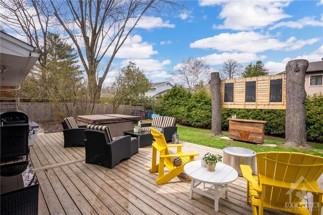 100' wide backyard with a cedar deck, hot tub. | Image 28