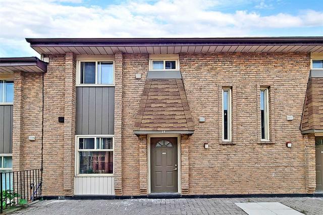34 - 40 Rexdale Blvd, Townhouse with 3 bedrooms, 2 bathrooms and 1 parking in Toronto ON | Image 1