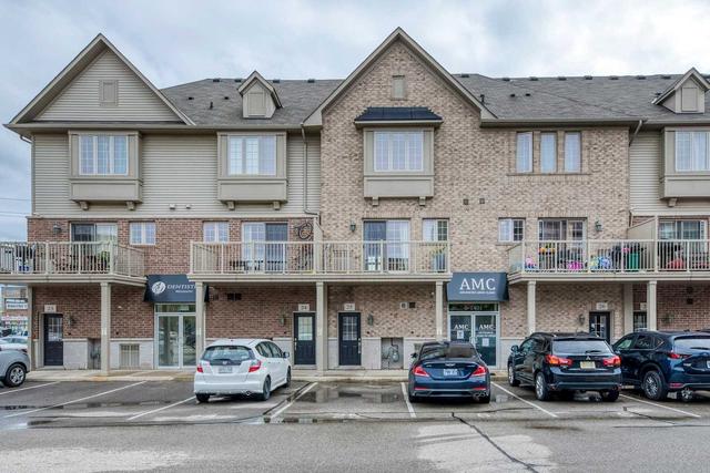 25 - 1401 Plains Rd E, Townhouse with 2 bedrooms, 3 bathrooms and 1 parking in Burlington ON | Image 1