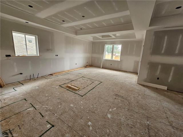 View of kitchen and dining area. | Image 5