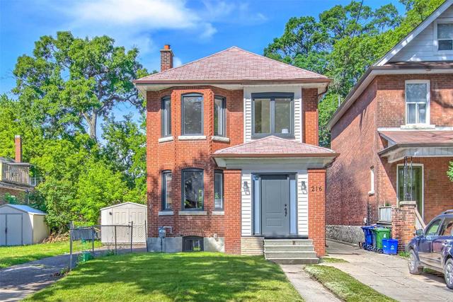 216 Evelyn Ave, House detached with 4 bedrooms, 4 bathrooms and 3 parking in Toronto ON | Image 1