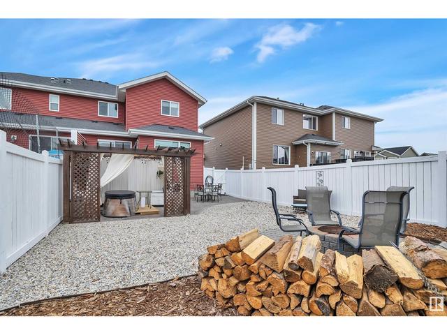 421 Simmonds Wy, House semidetached with 4 bedrooms, 2 bathrooms and null parking in Leduc AB | Image 54