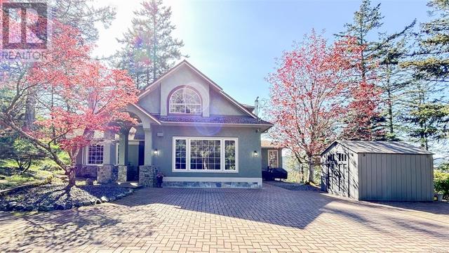 880 Hackamore Dr, House detached with 5 bedrooms, 3 bathrooms and 8 parking in Metchosin BC | Image 1