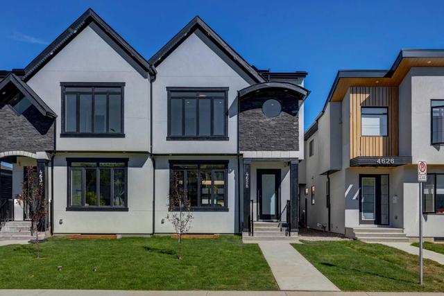 4628 15 Avenue Nw, Home with 4 bedrooms, 3 bathrooms and 2 parking in Calgary AB | Image 1