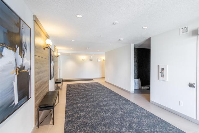 208 - 30 Shawnee Common Sw, Condo with 2 bedrooms, 2 bathrooms and 1 parking in Calgary AB | Image 2