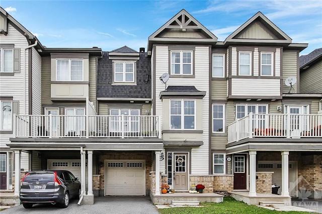 461 Meadowhawk Crescent, Townhouse with 2 bedrooms, 2 bathrooms and 3 parking in Ottawa ON | Image 1