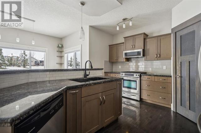 226 Crystal Green Place, House detached with 3 bedrooms, 2 bathrooms and 4 parking in Okotoks AB | Image 16