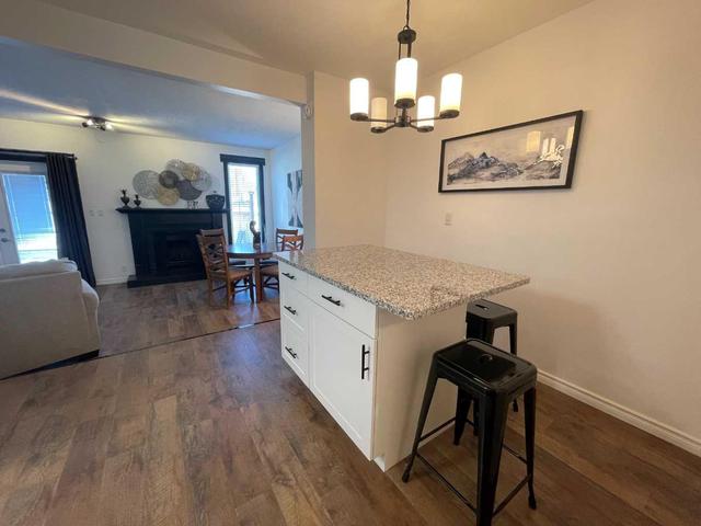 22 - 4025 Glacier Avenue S, Home with 3 bedrooms, 2 bathrooms and 2 parking in Lethbridge AB | Image 3